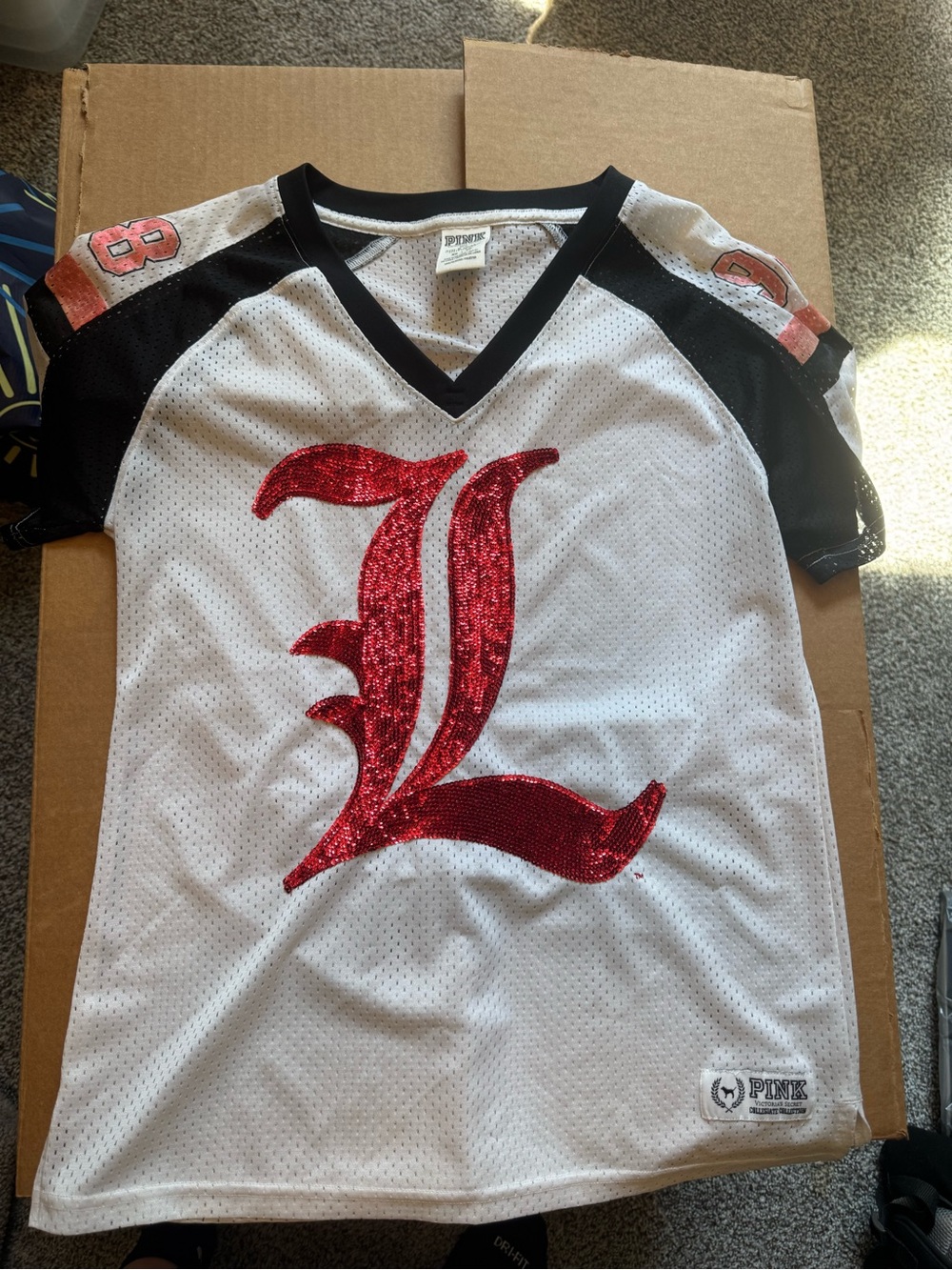 PINK Victoria's Secret White & Black Sequin Louisville L Jersey Top